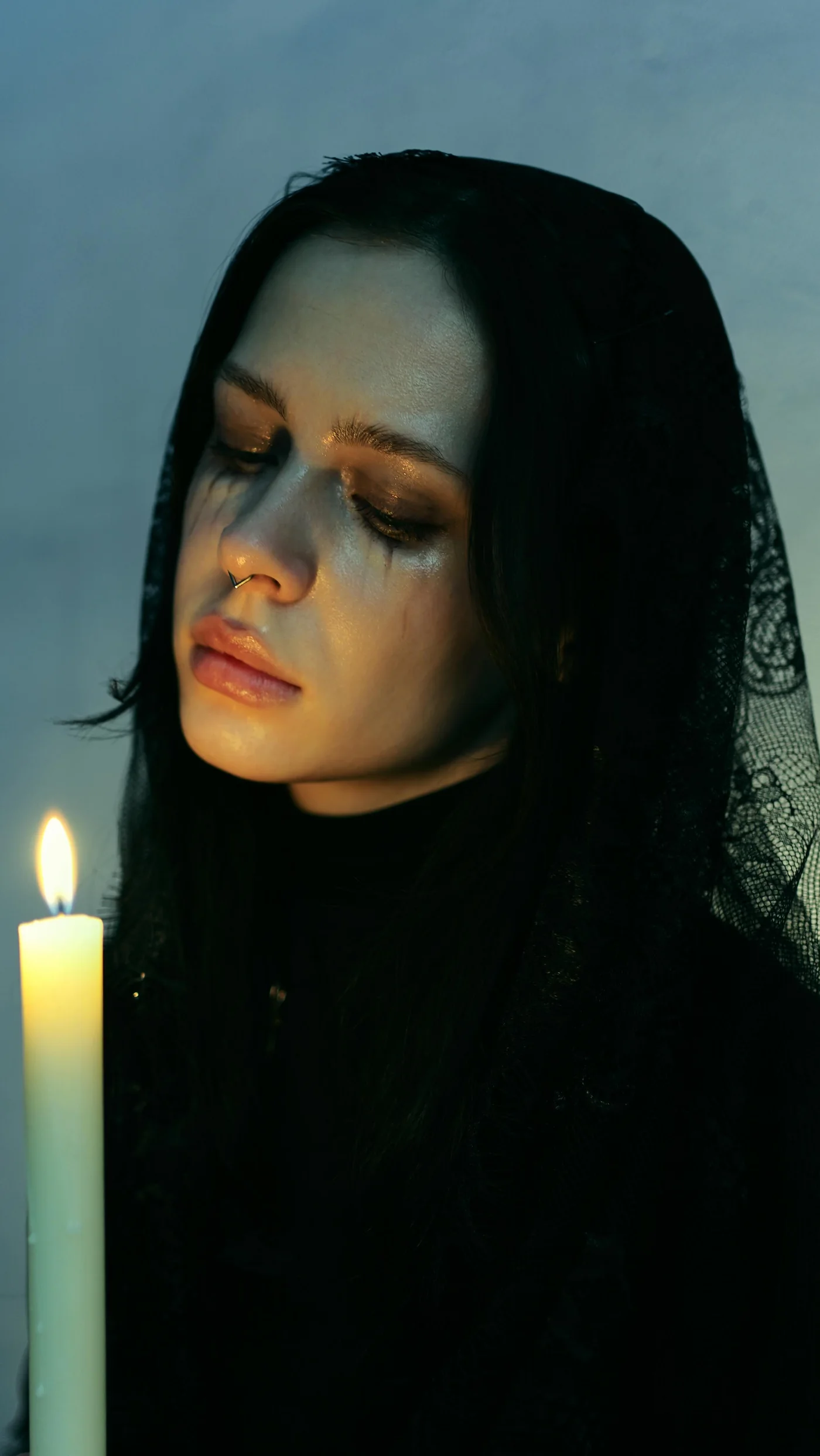 Portrait lit by a candle