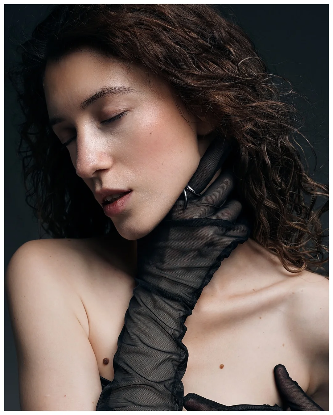 Portrait with sheer black gloves