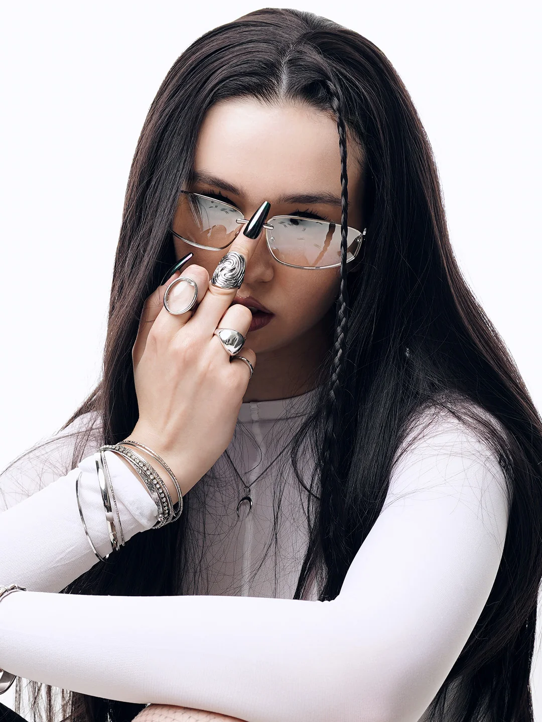 Portrait with silver rings and glasses