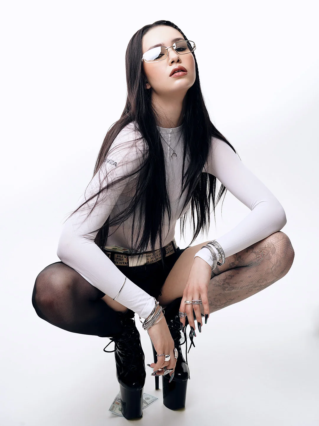 Crouching portrait, hands on knees